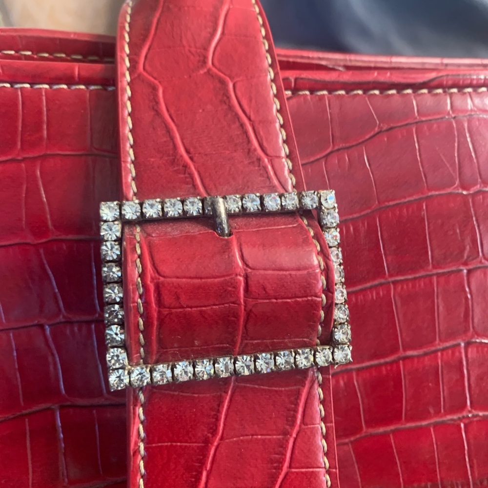 Apostrophe purse good cond 1 stone missing from buckle/slight blemish in corner